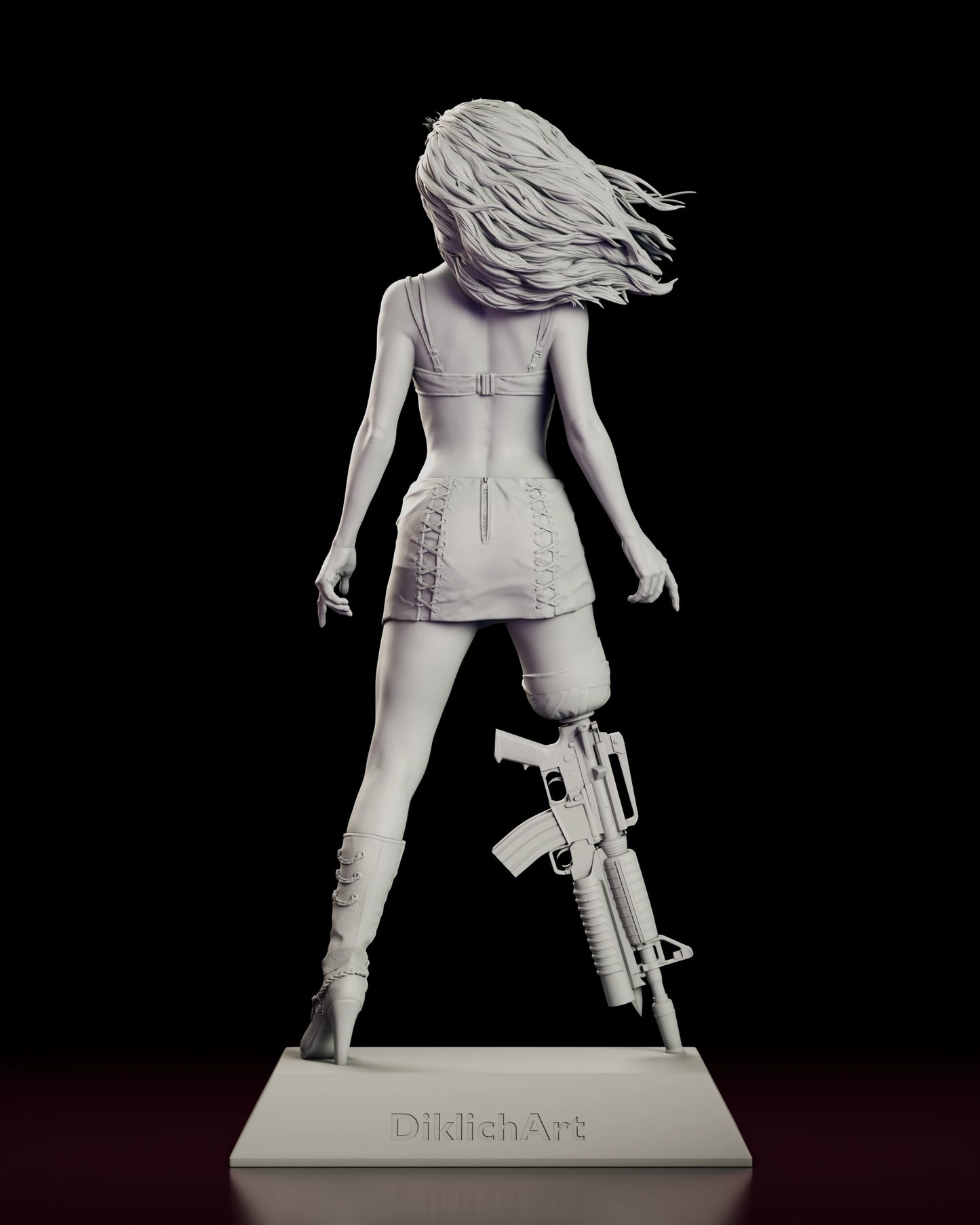 Back view of the Cherry Darling figure model kit showing the corset lacing up the skirt, the bow at the back of the bandeau top and the sculptor mark on the rear of the base