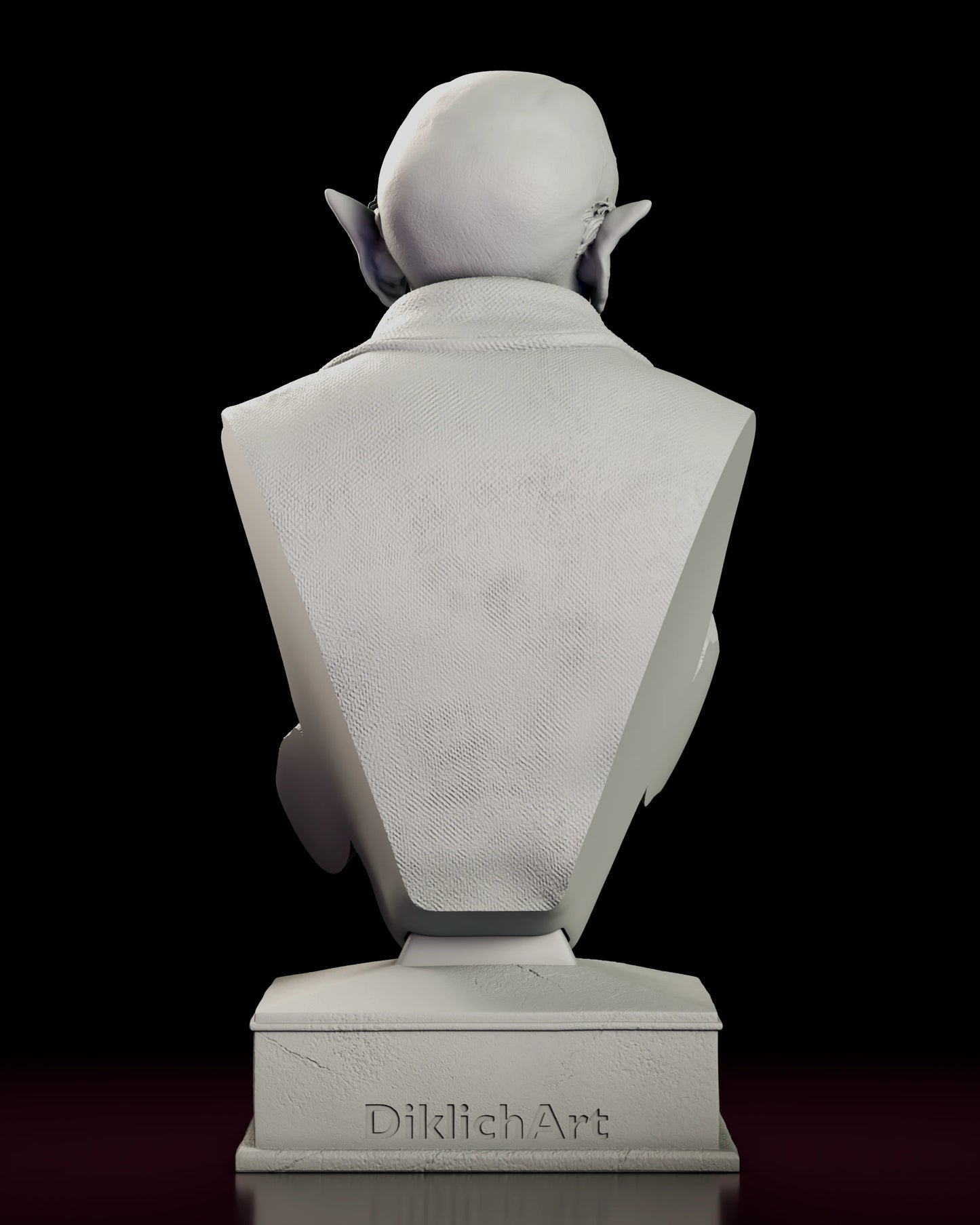 Rear view of the Count Orlok Nosferatu portrait bust showing the back of the collared coat and the plain rear face of the stone plinth