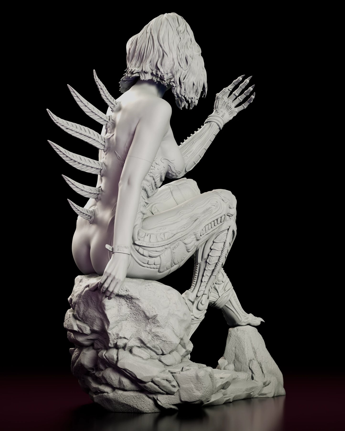 Rear view of the Sil figure model kit showing the full fan of curved spines across the back