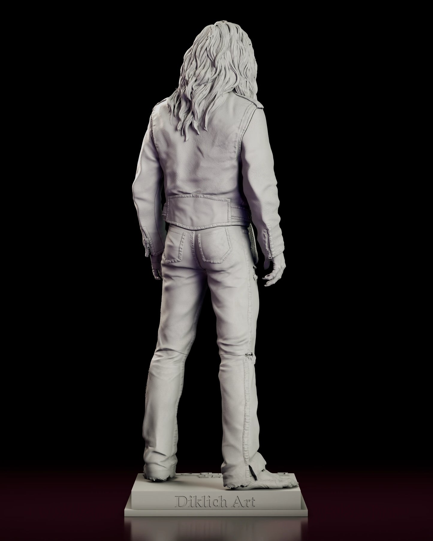 Rear view of the vampire Dwayne figure model kit showing the hair spread over the jacket back and the sculptor name on the rear edge of the base