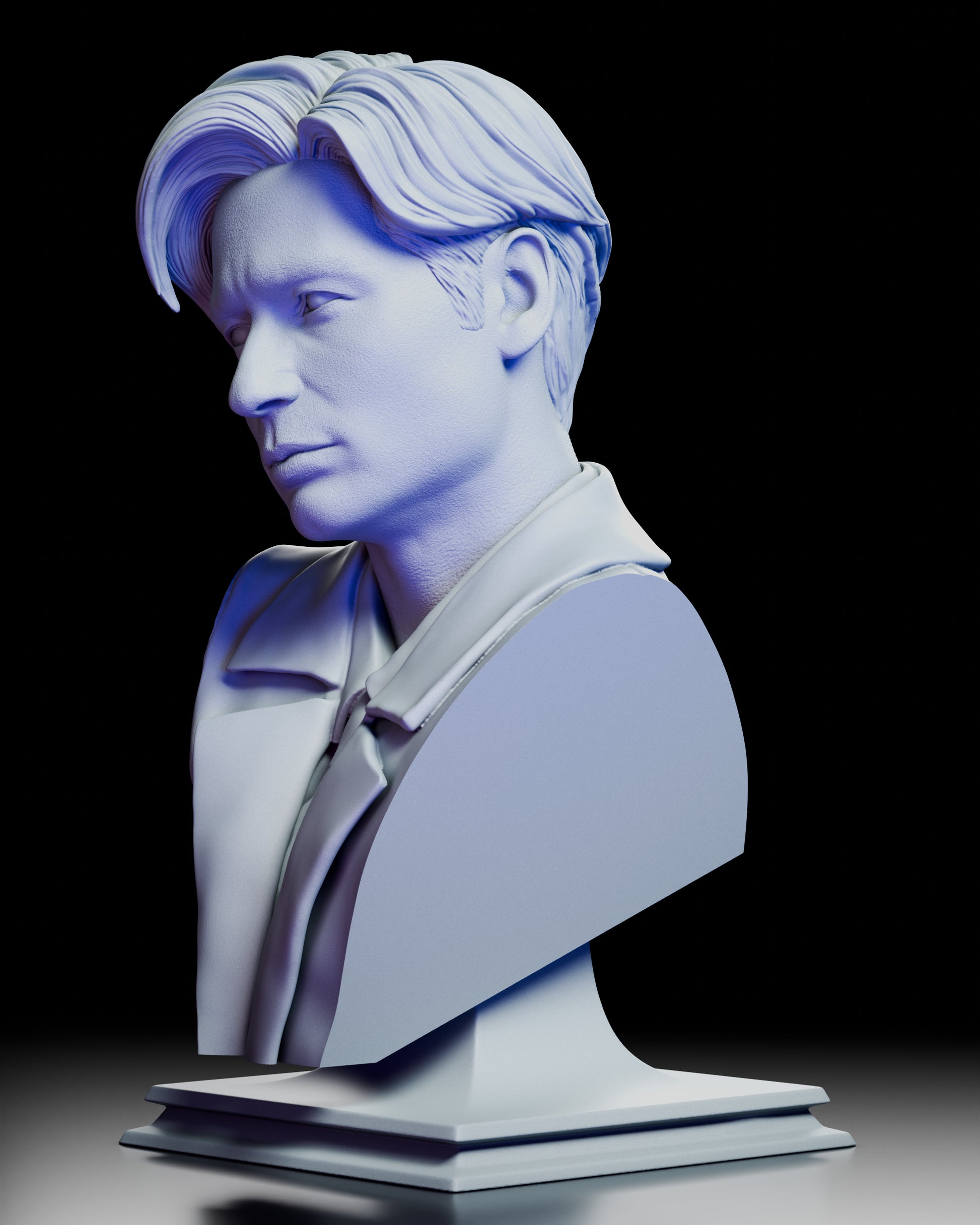 Left angled view highlighting the profile, hair flow, and sharp suit details on the Fox Mulder bust
