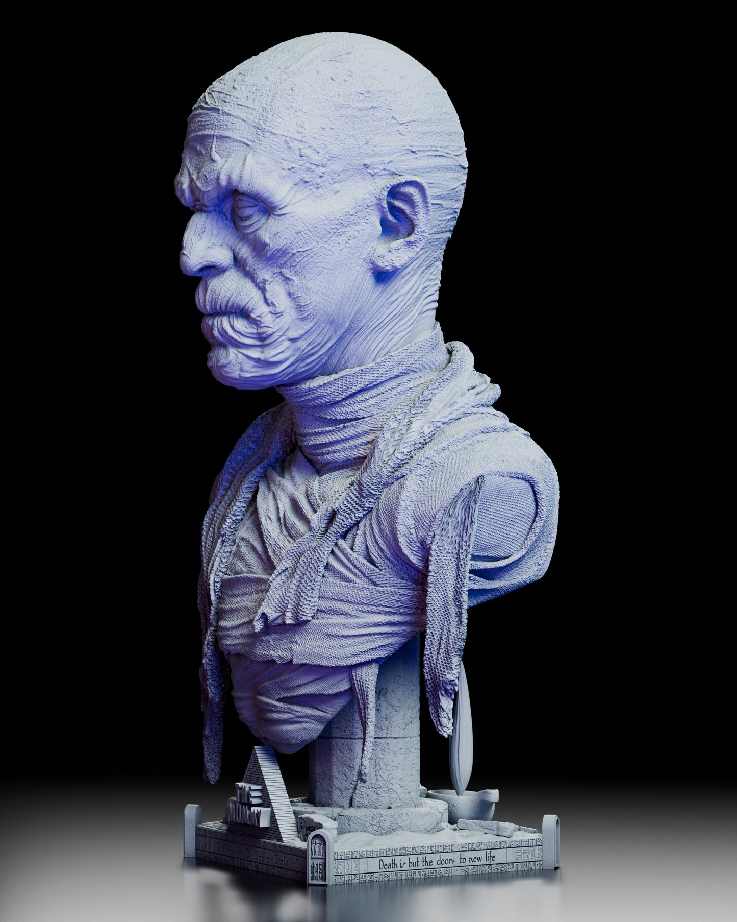 Left side profile of The Mummy portrait bust showing detailed textures and hieroglyphic base accents