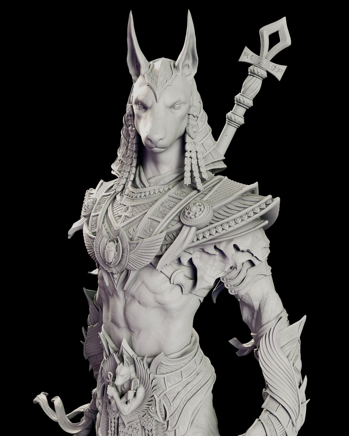 Close view of Anubis showing the broad winged collar, hieroglyph-carved armour and ankh staff