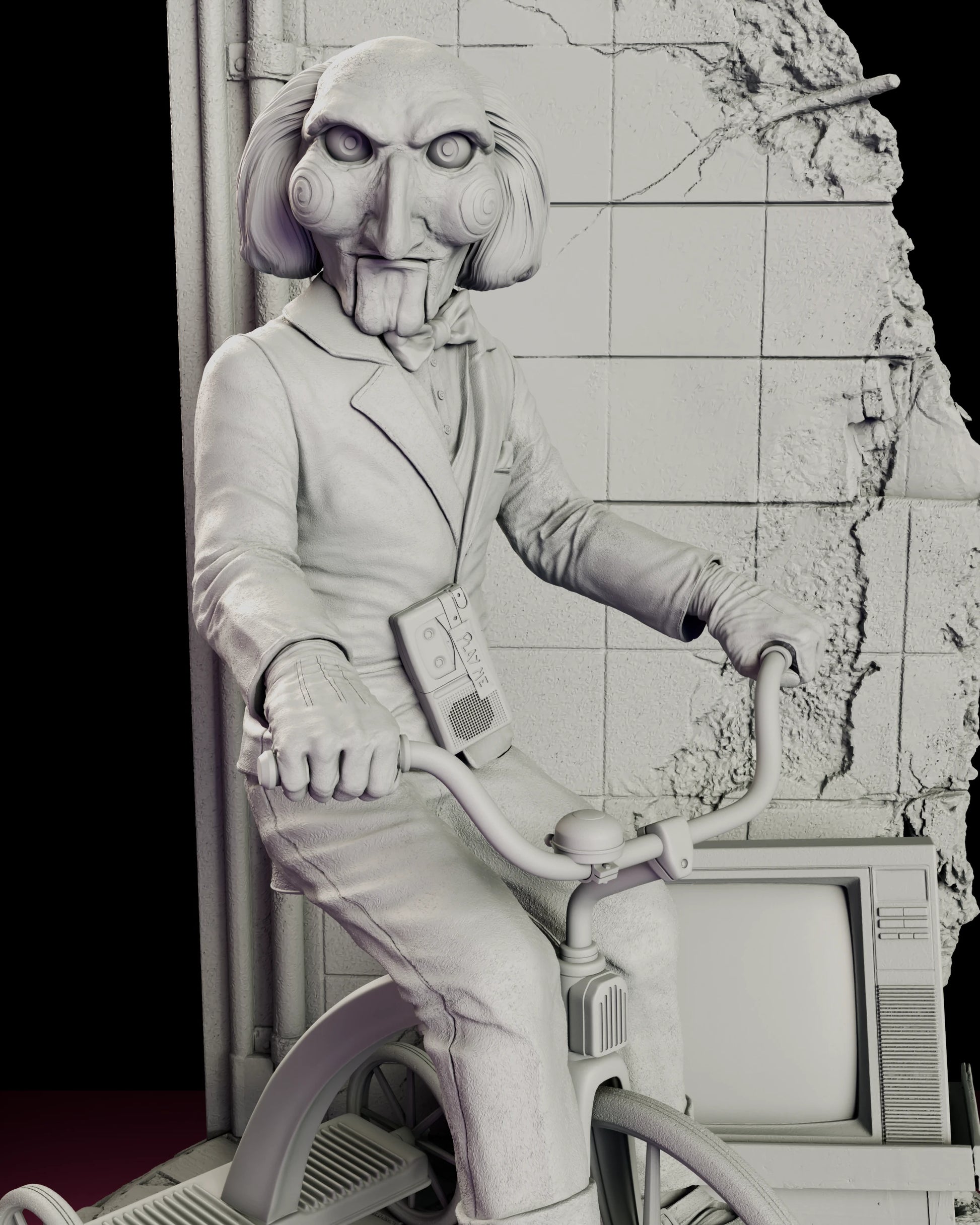 Close view of the upper body of the Billy the Puppet figure model kit, showing the cassette recorder hanging on its strap, the bow tie and suit lapels and both hands closed over the tricycle grips