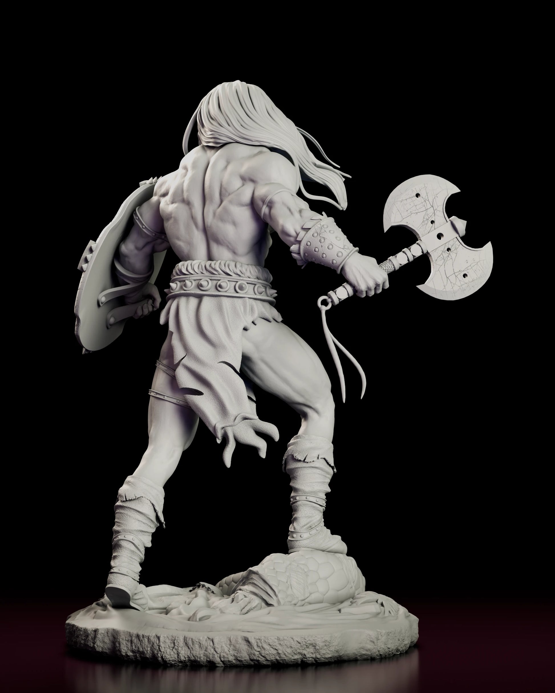 Rear view of the Conan the Cimmerian figure model kit showing the sculpted back and shoulders, the shield strap across the forearm and the axe extended to the side