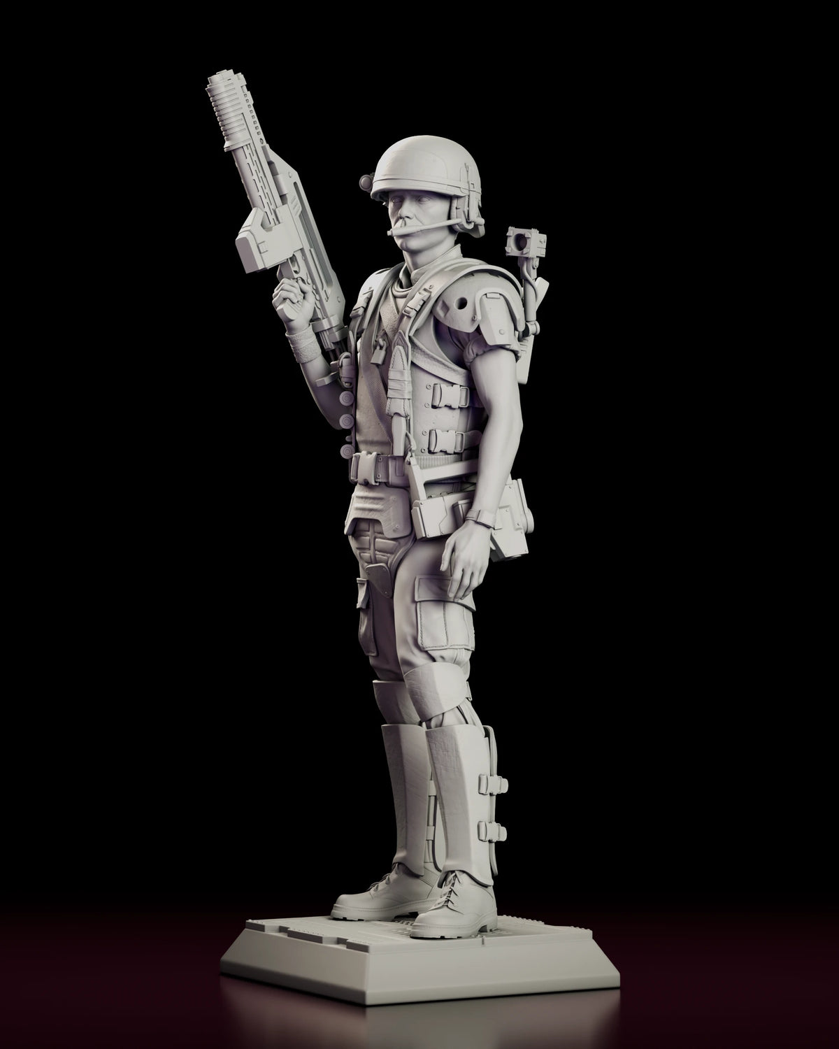 Left side view of the Corporal Hicks figure model kit showing the thigh holster and the camera unit on the shoulder plate