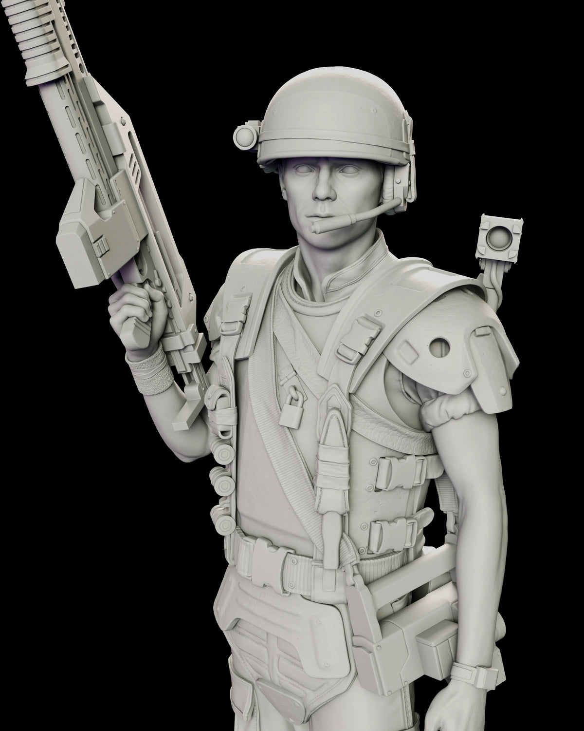 Upper body detail of Corporal Hicks holding his rifle muzzle-up beside the shoulder armour, webbing buckles and mounted camera unit
