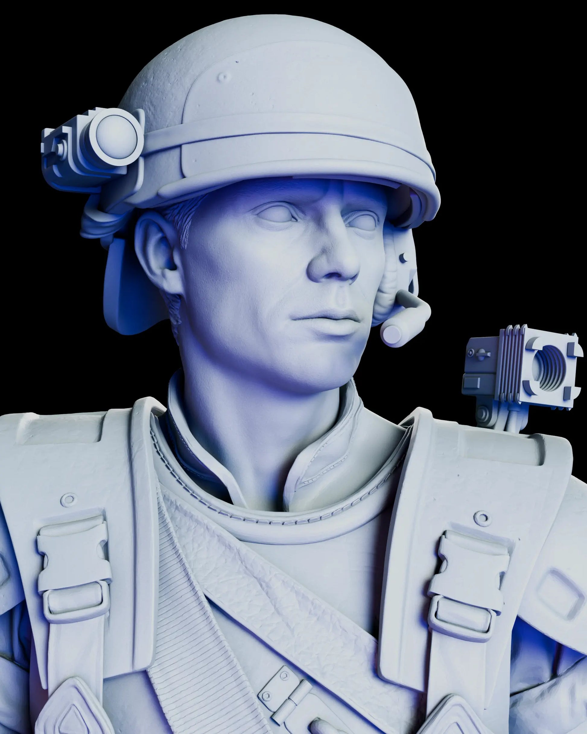 Close-up detail of Corporal Hicks helmet and face featuring tactical lights, communication headset, determined expression, ribbed neck seal, and shoulder-mounted camera unit