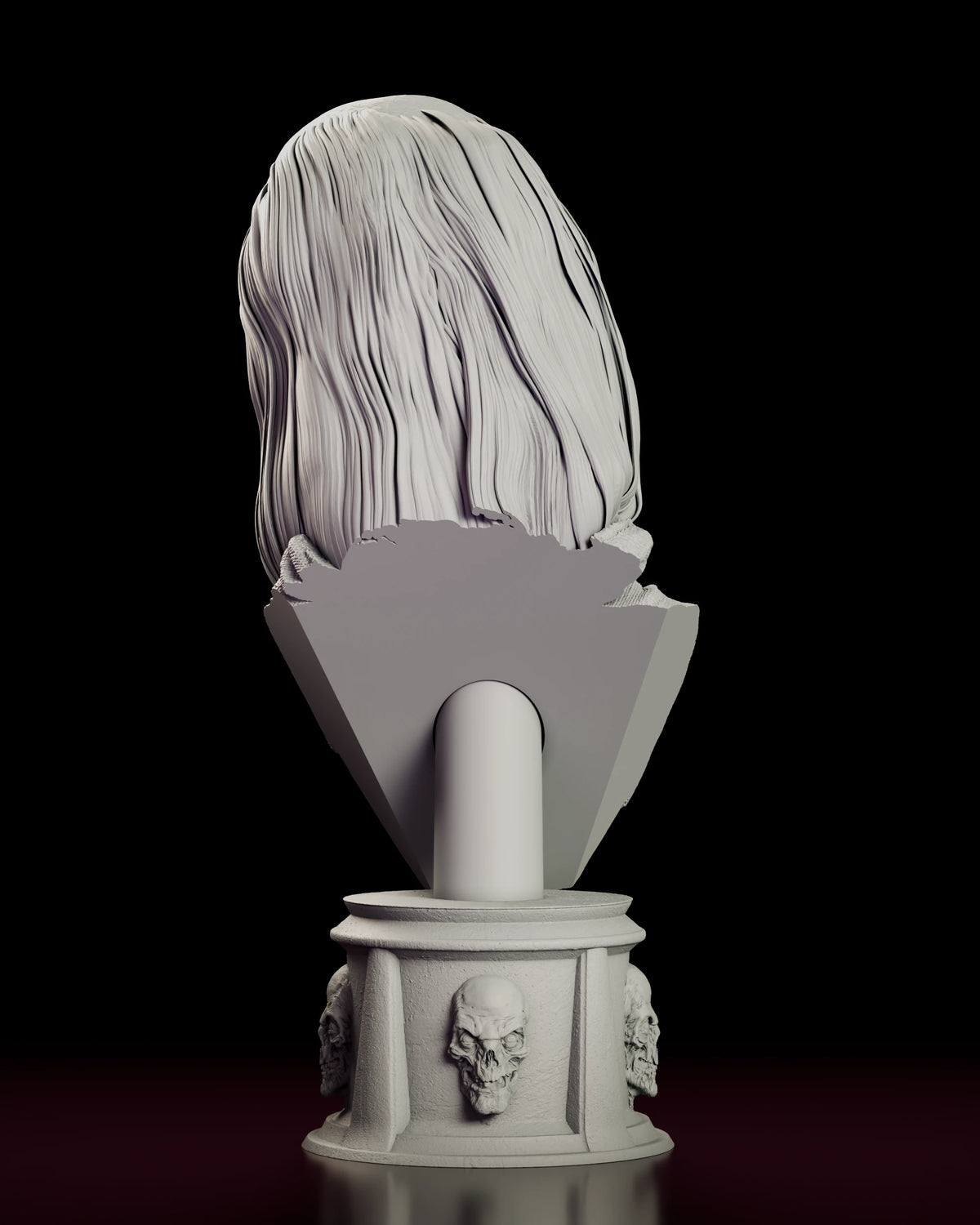 Rear view of the Crypt Keeper bust figure model kit showing the full fall of the sculpted hair across the back and the plinth with its ring of skulls below