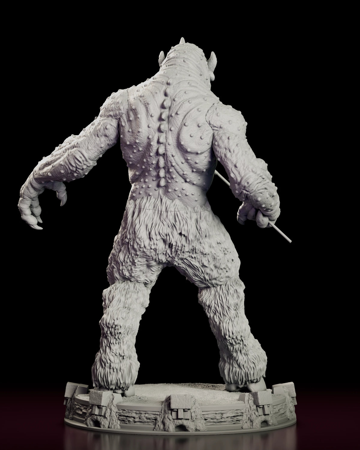 Rear view of the Cyclops figure model kit showing the ridge of bony nodules running down the spine and the matted fur of the legs