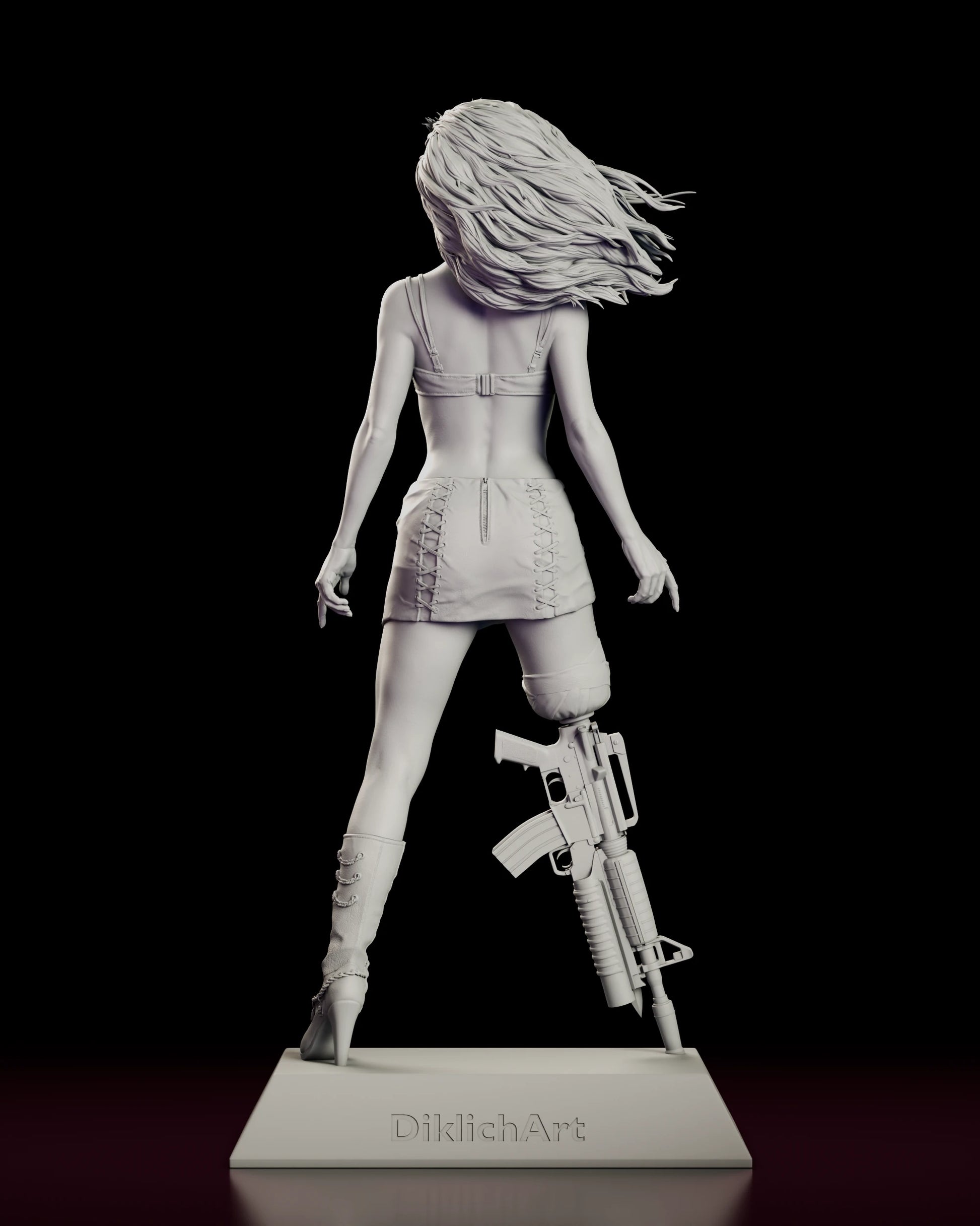 Back view of the Cherry Darling figure model kit showing the corset lacing up the skirt, the bow at the back of the bandeau top and the sculptor mark on the rear of the base