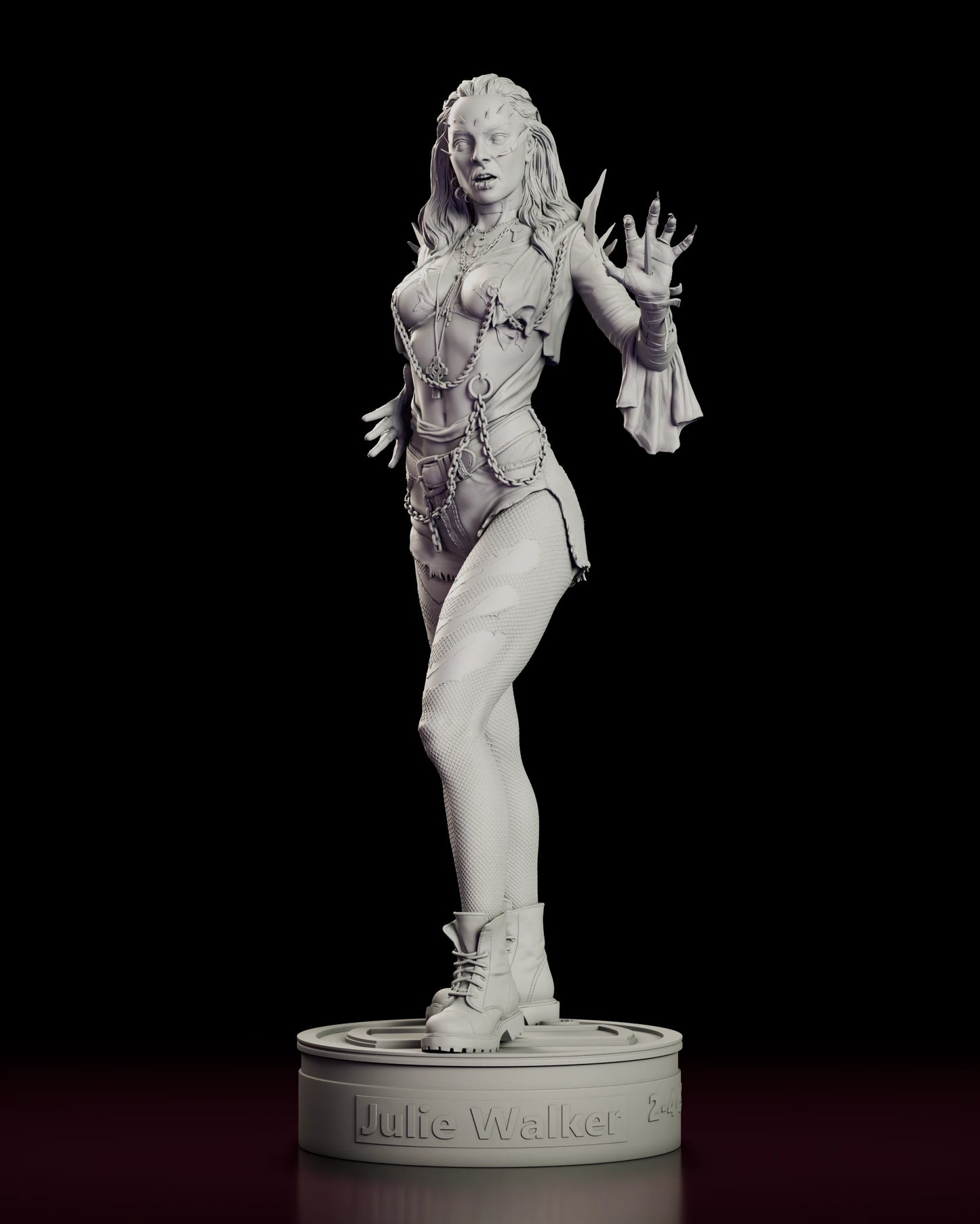 Front view of the Julie Walker figure model kit standing with one hand raised, chains across the torso and torn denim over laddered fishnets