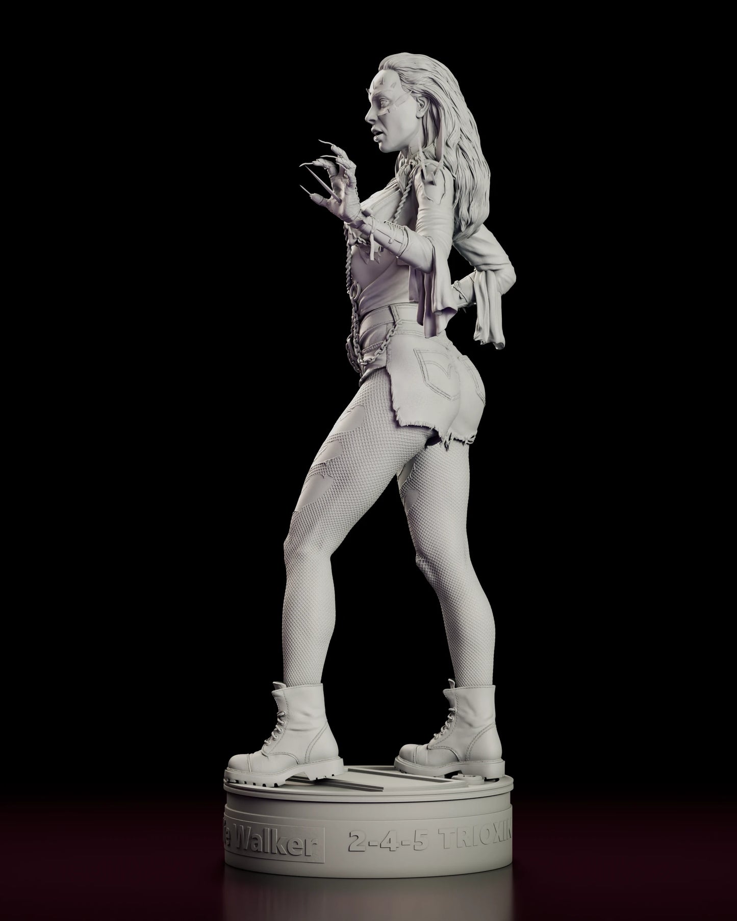 Left side view of the Julie Walker figure model kit showing the raised clawed hand, the chain falling from the belt and the lace-up boots