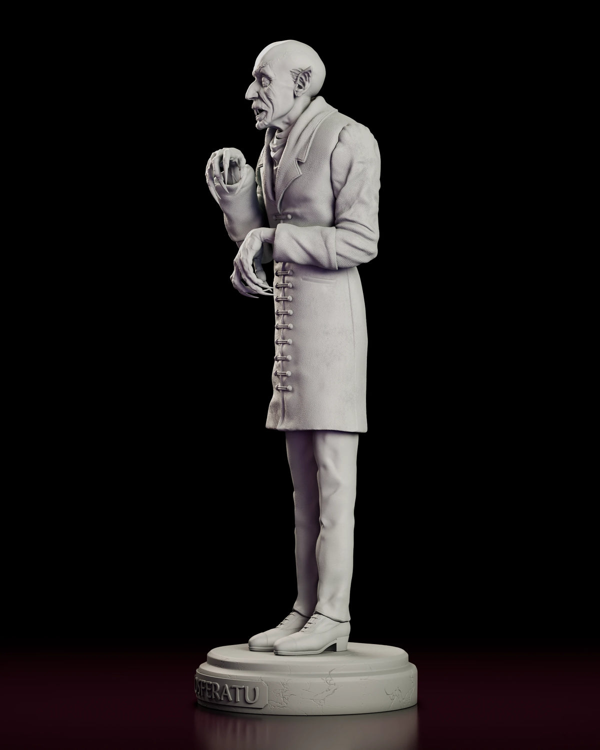 Left side view of the Count Orlok Nosferatu maquette figure model kit showing the loose hanging hand, the fall of the coat and the narrow trousers breaking over buttoned shoes