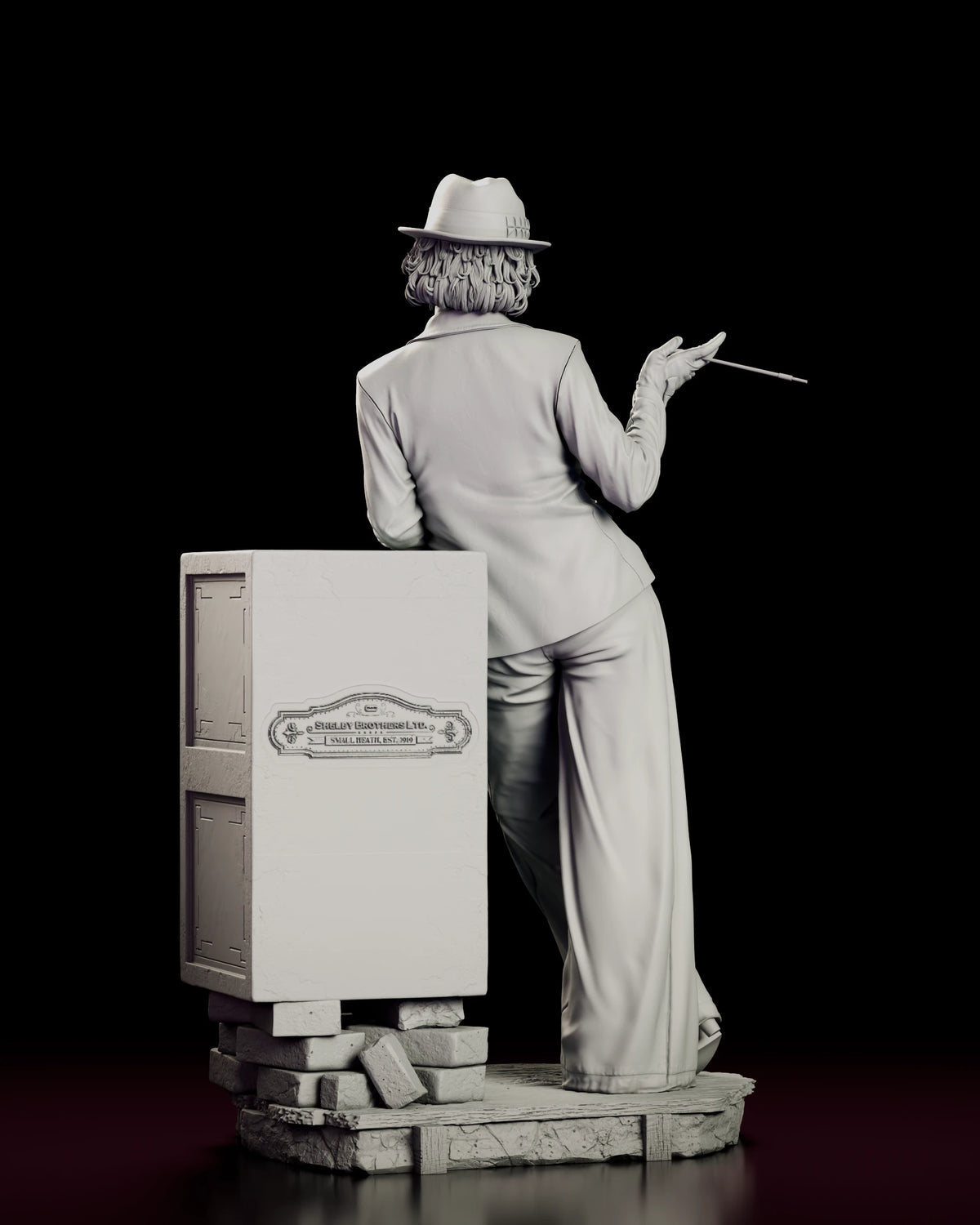 Rear view of the Polly Gray figure model kit showing the jacket back, hat and the safe on its pile of bricks