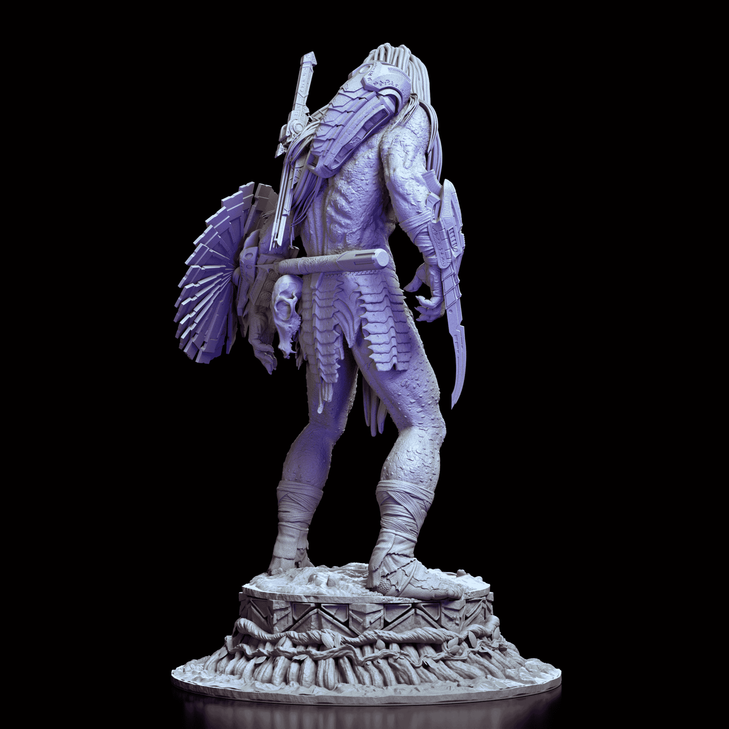 Back view of Predator resin model kit with detailed dreadlocks and armor on circular jungle base
