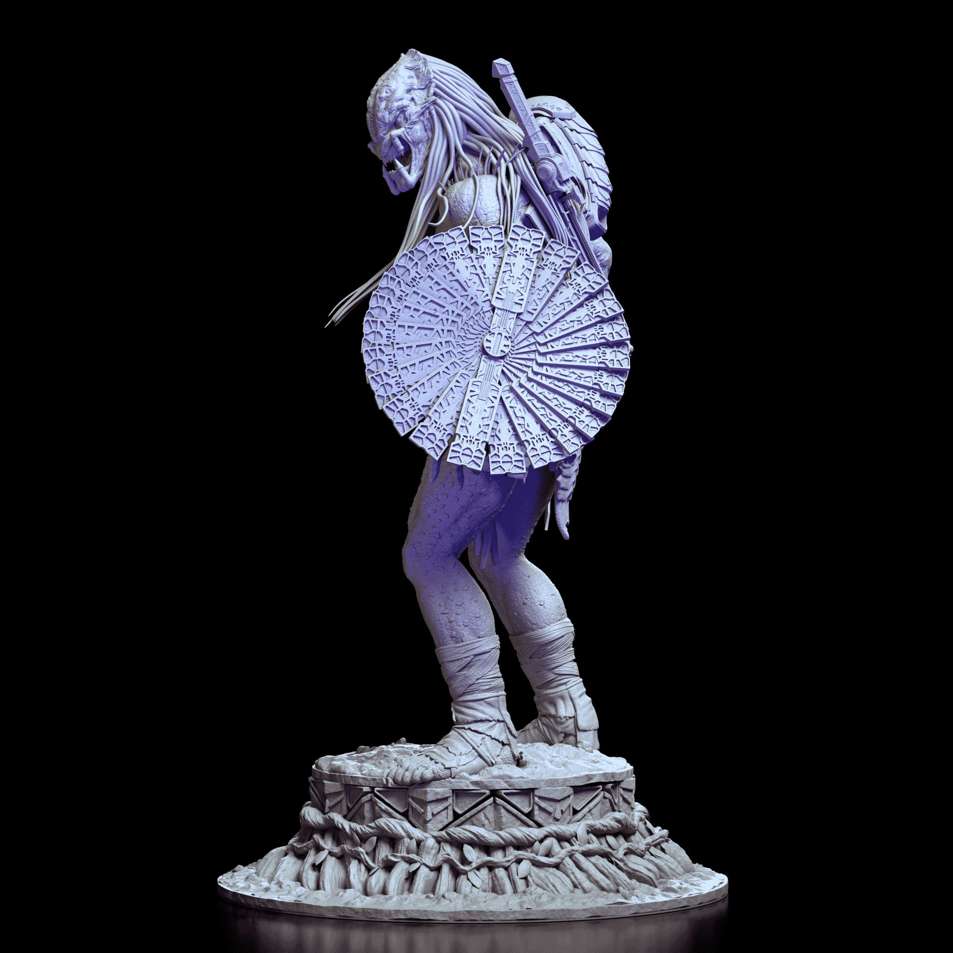 Left side of Predator figure with tribal shield raised and weapon holstered on back
