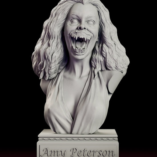 Rotating view of the Amy Peterson figure model kit showing the vampire transformation bust on a plinth carved with her name