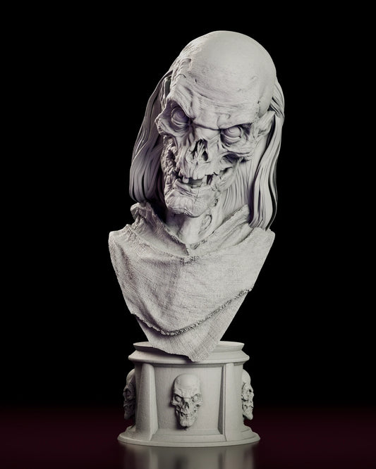 Rotating 360 degree view of the Crypt Keeper bust figure model kit, showing the wrinkled bare cranium, sunken eyes, wide toothy grin and long lank hair above a draped shroud on a column plinth ringed with skulls