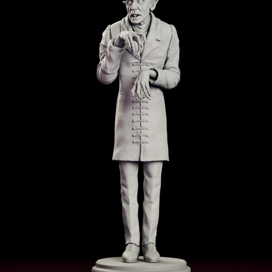 Rotating 360 degree view of the Count Orlok Nosferatu maquette figure model kit, showing the bald pointed-eared vampire in a long toggle-fastened frock coat with one clawed hand raised, standing on a stepped disc base