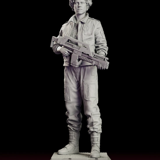 Rotating view of the Ripley figure model kit showing her standing with a pulse rifle held across her body on a low decking base