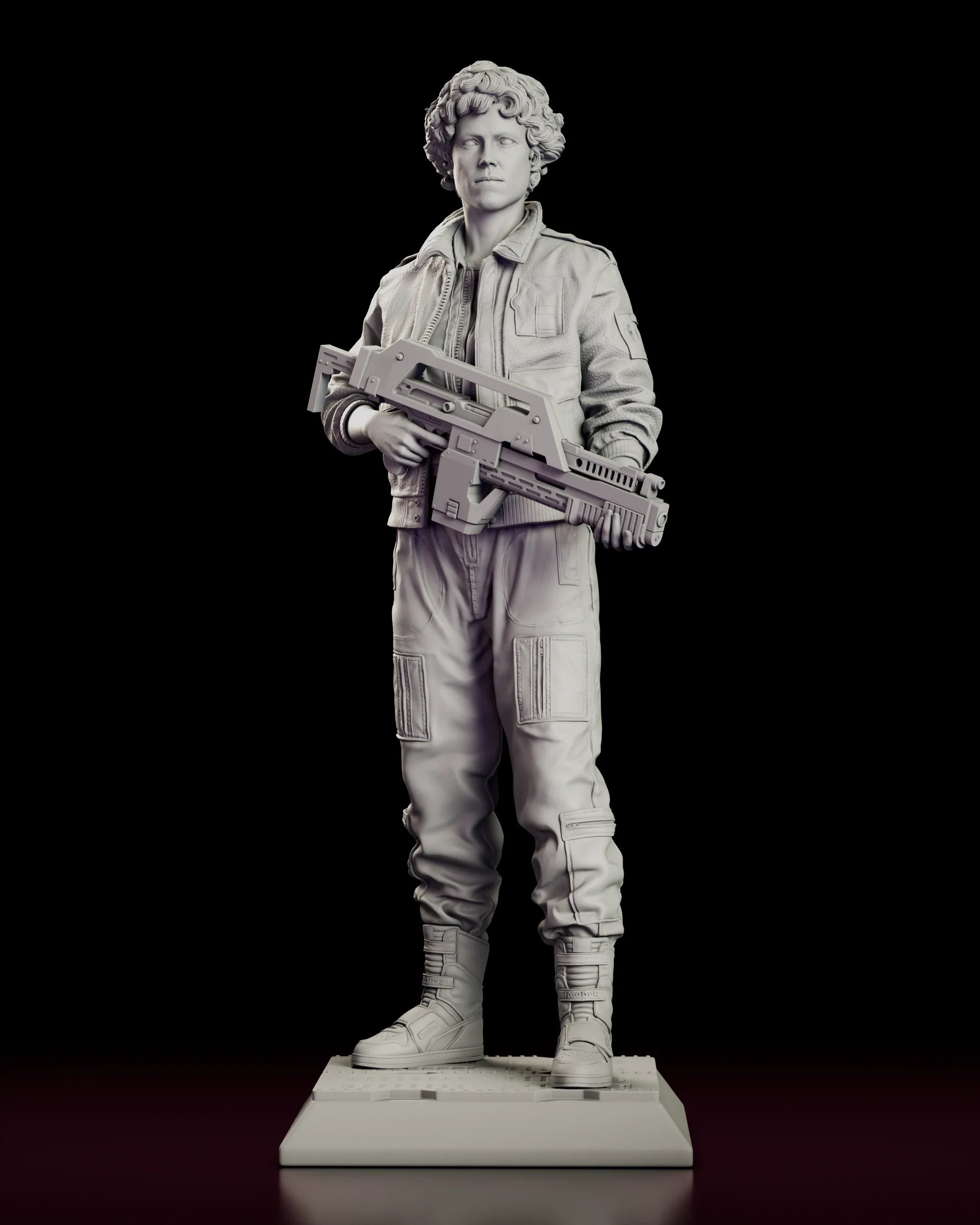 Rotating view of the Ripley figure model kit showing her standing with a pulse rifle held across her body on a low decking base