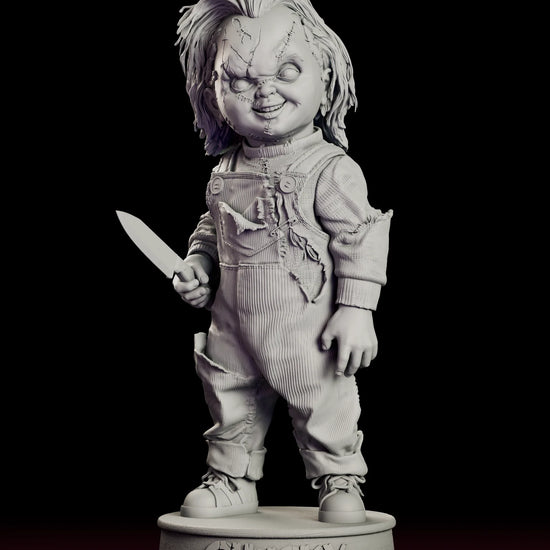 Rotating view of the Chucky figure model kit standing with a kitchen knife on a nameplate base
