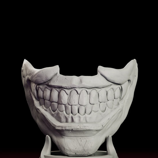 Turntable video of the Twisty the Clown Smile Mask figure model kit showing the oversized grinning mouth mask on a curved display stand
