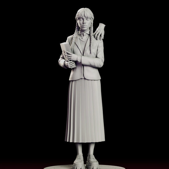 Rotating 360 degree view of the Wednesday Addams figure model kit, showing the braided student in a crested Nevermore blazer and pleated skirt holding an engraved book, with Thing perched on her left shoulder and the academy emblem on the round base