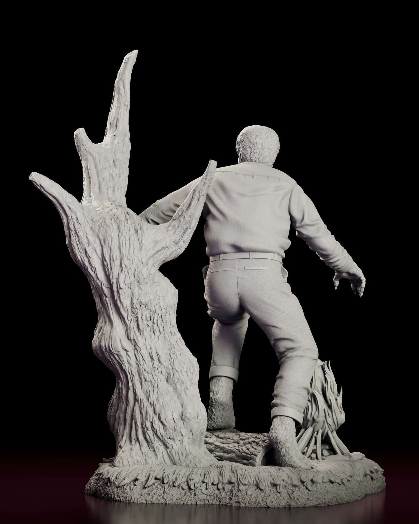 Rear view of the Wolfman figure model kit showing the back of the work shirt and belt, the cuffed trouser hems over furred feet and the split trunk of the dead tree