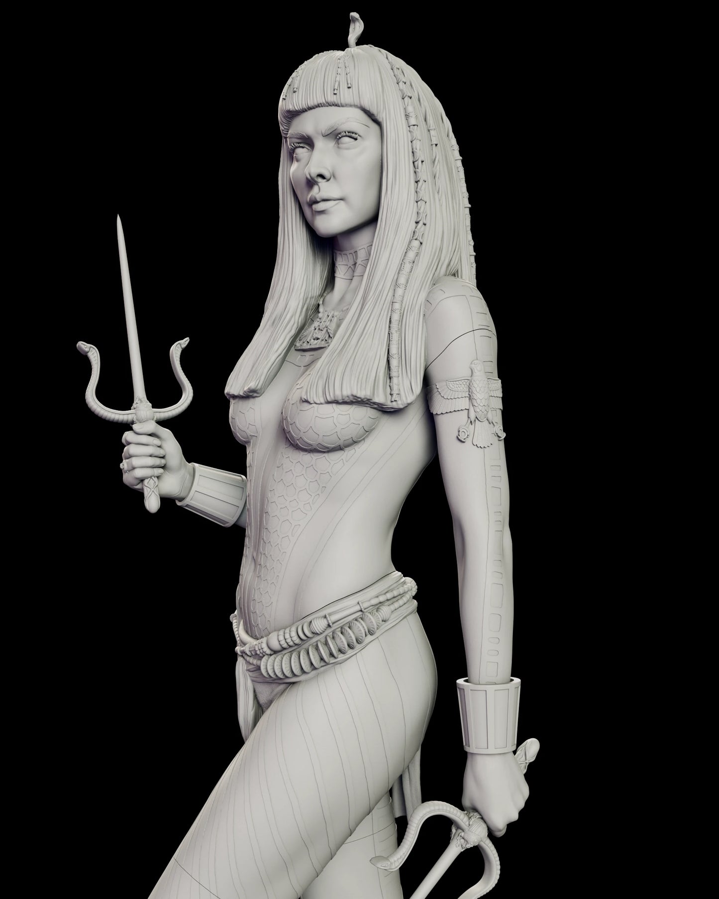 Detail view of the Anck-Su-Namun figure model kit showing the optional sai with serpent prongs and a scarab guard, the beaded braids and the winged falcon armband