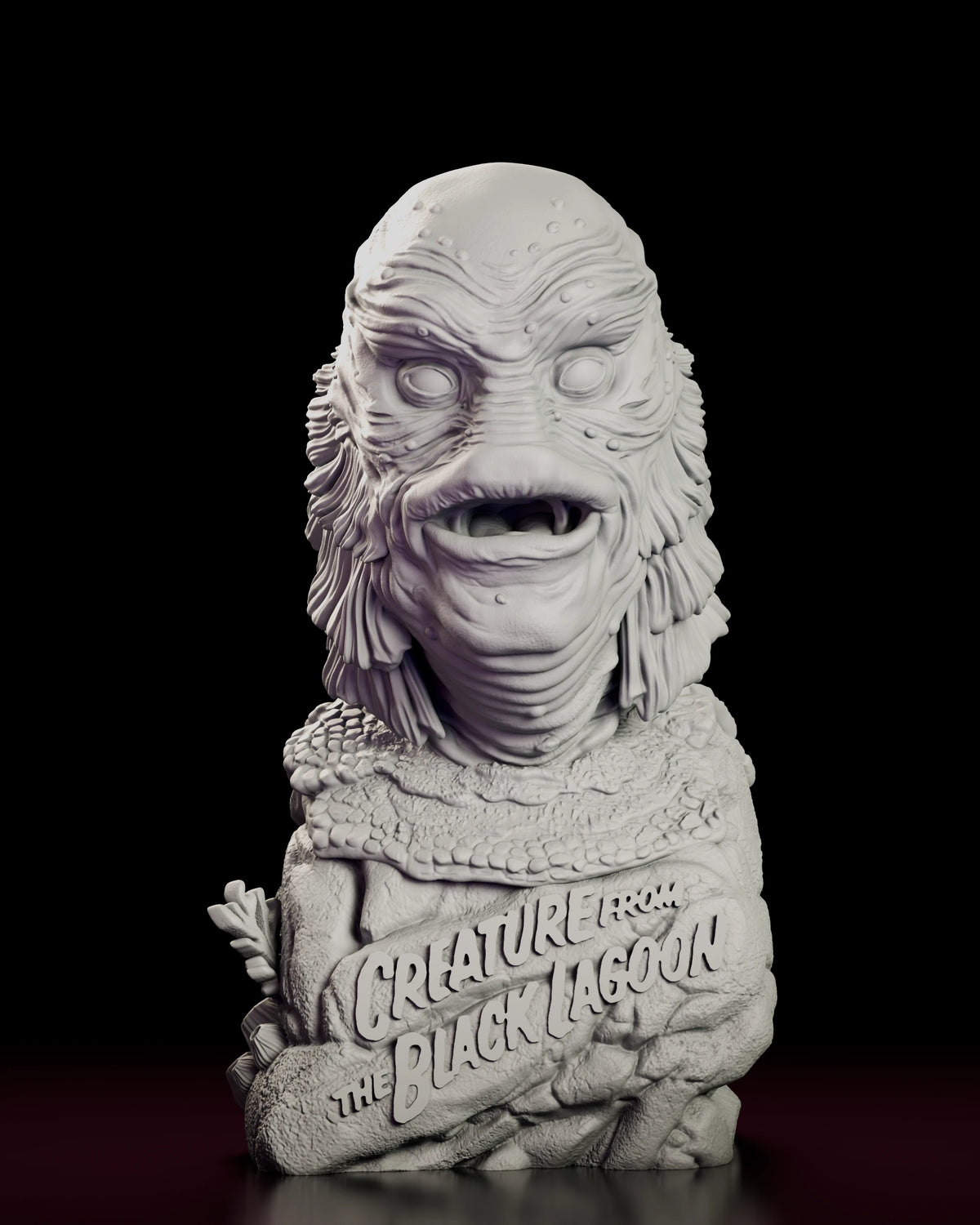 Front view of The Gill Man Bust figure model kit with Creature from the Black Lagoon lettering on the rock base
