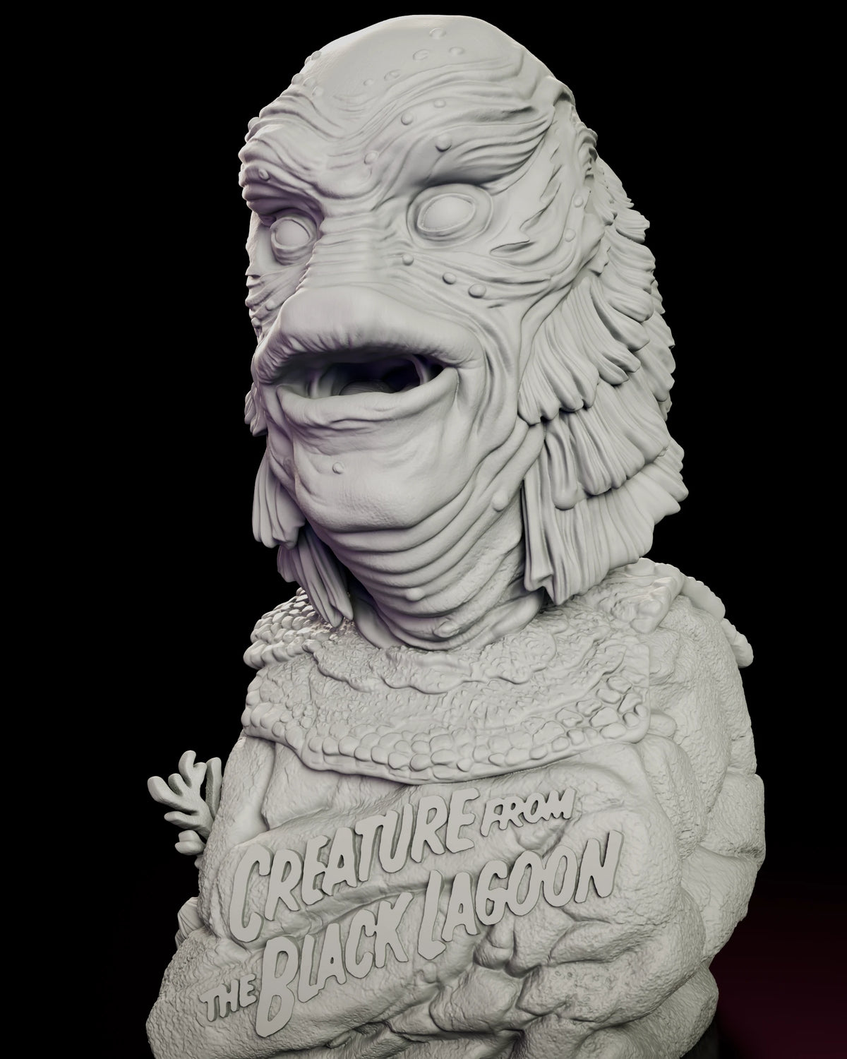 Three-quarter view of the Gill Man bust showing the open mouth, ridged scales and layered gill fins