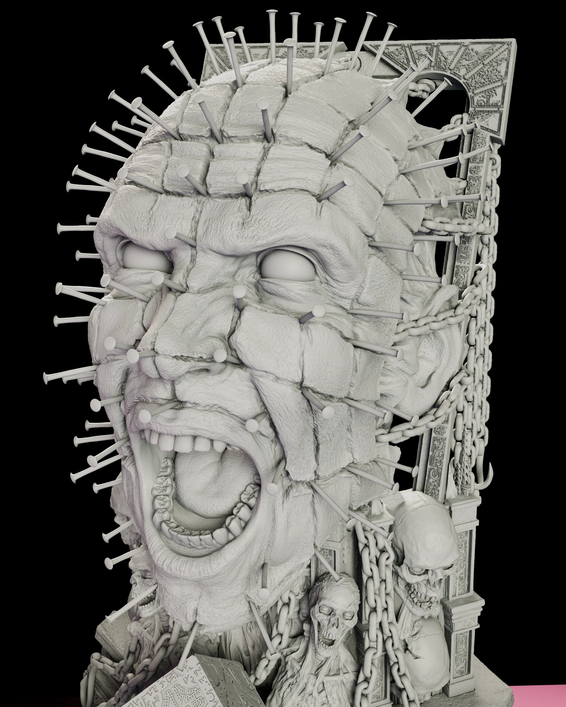 Close detail of the Pinhead bust figure model kit showing the gridded scalp with a nail driven at every intersection and the mouth open on a scream