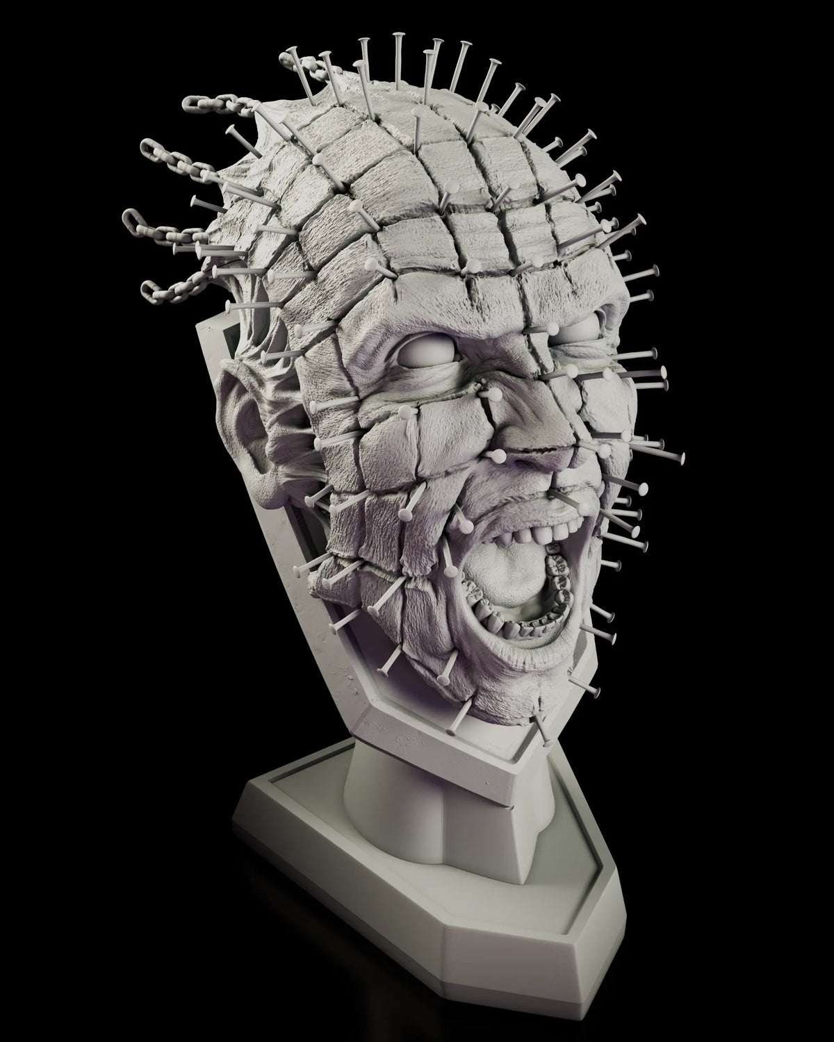 Three-quarter view of the Pinhead full scale bust showing the nail grid and hooked chains pulling from the back of the head