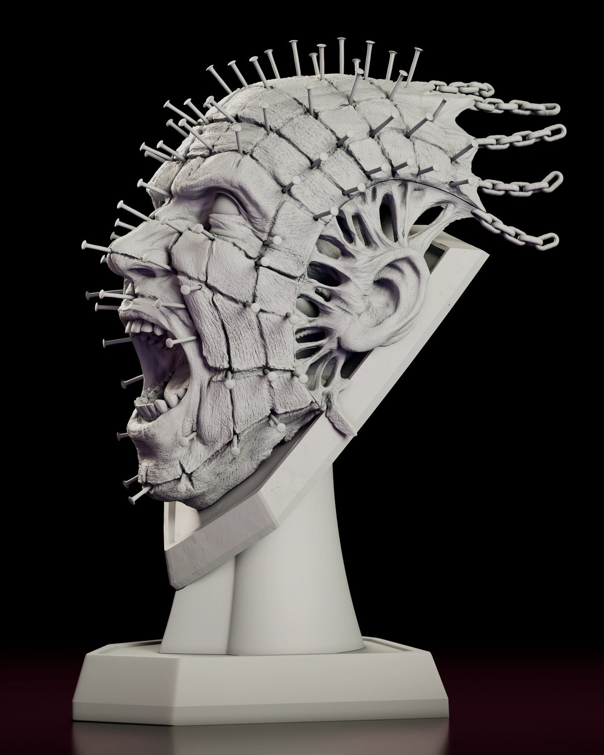 Left side view of the Pinhead full scale bust screaming with chains torn from the back of the head