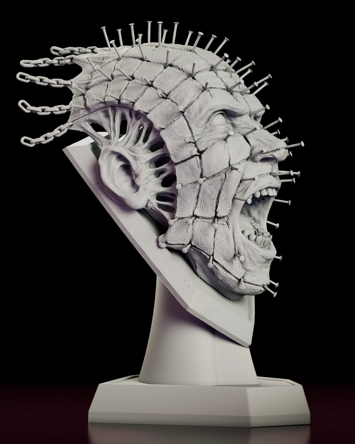 Right side view of the Pinhead full scale bust with chains and nails radiating from the skull