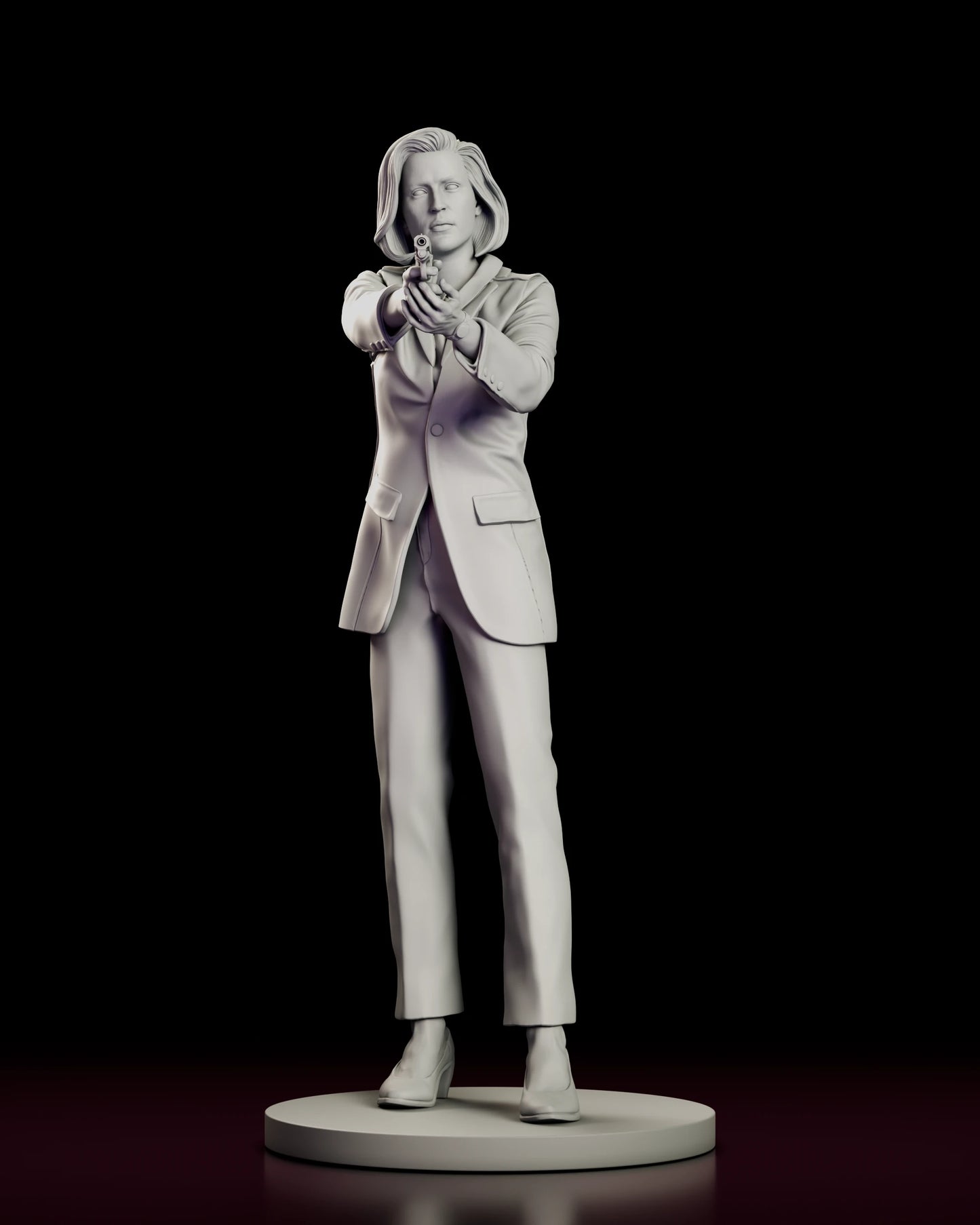 Front view of the Dana Scully figure model kit standing in a long blazer and trousers with the sidearm levelled at the viewer