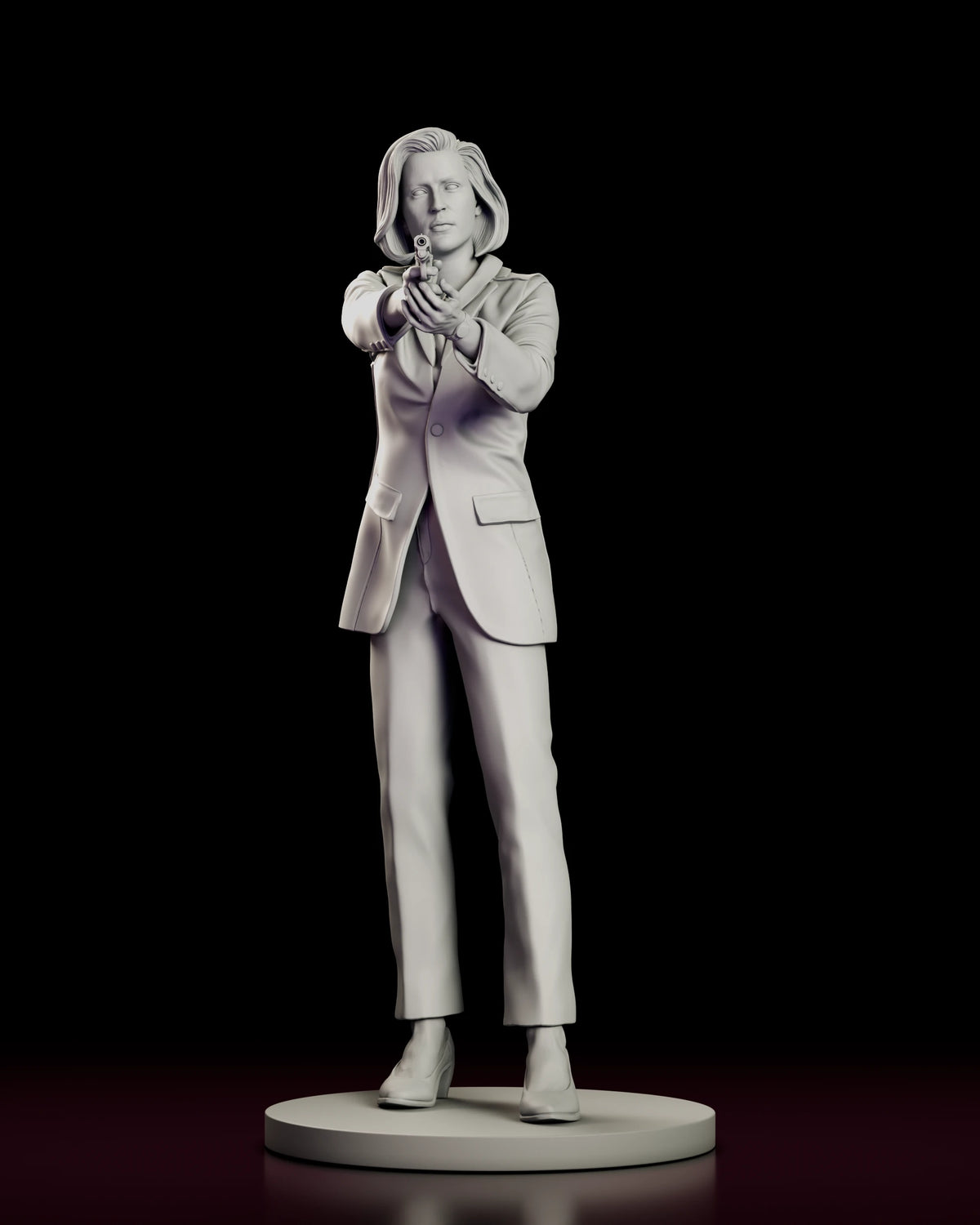 Front view of the Dana Scully figure model kit standing in a long blazer and trousers with the sidearm levelled at the viewer