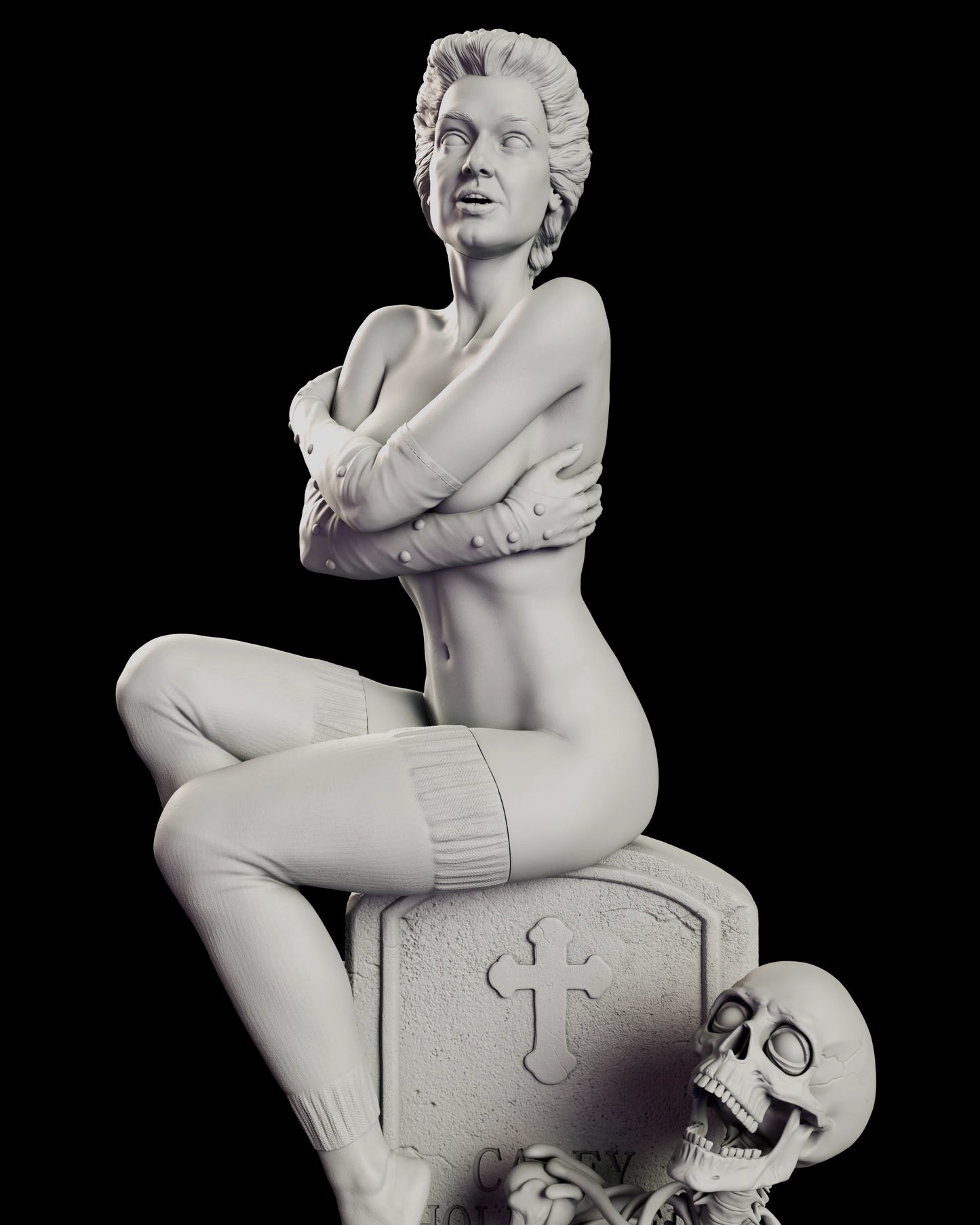 Close view of the Trash figure model kit showing the folded arms, studded arm warmers, ribbed leg warmers and the carved cross on the headstone