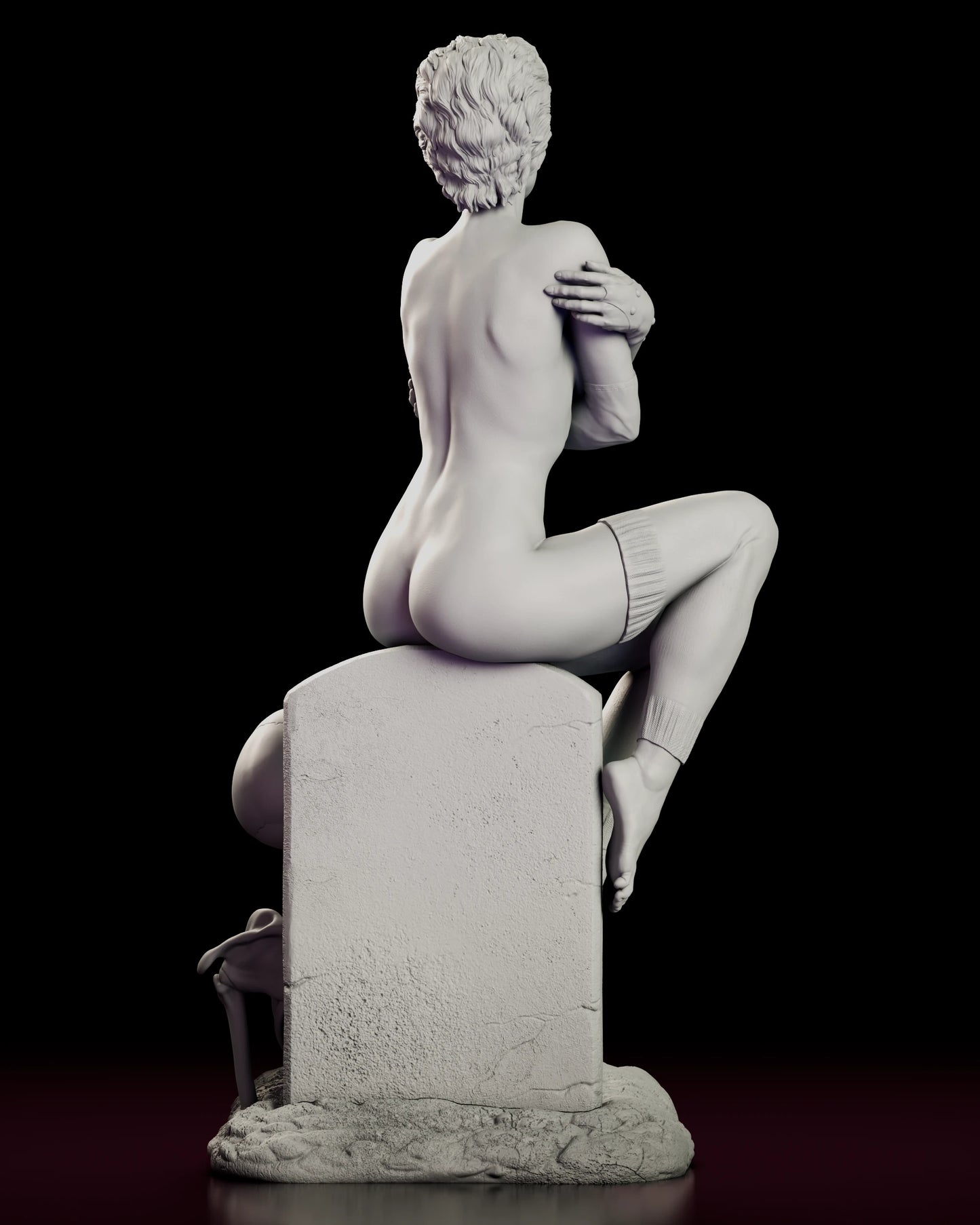 Rear view of the Trash figure model kit showing the back of the headstone, the sweep of teased hair and the skeleton rising from the grave