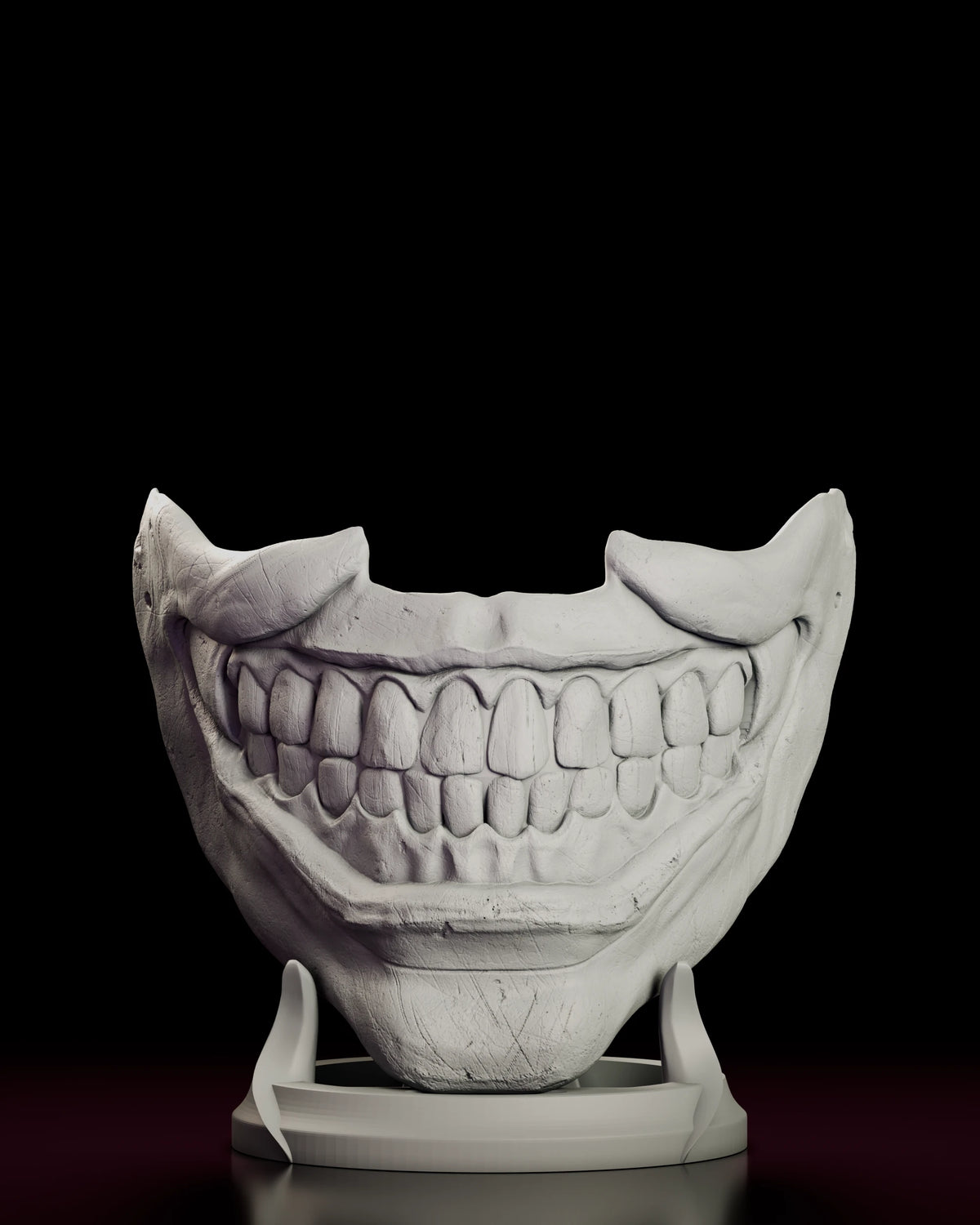 Front view of the Twisty the Clown Smile Mask figure model kit grinning on its display stand