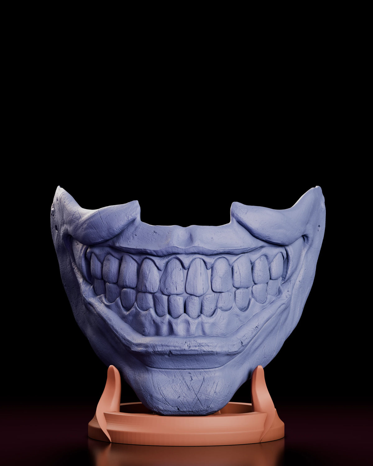 Parts breakdown of the Twisty the Clown mask figure model kit with mask and display stand shown in separate colours