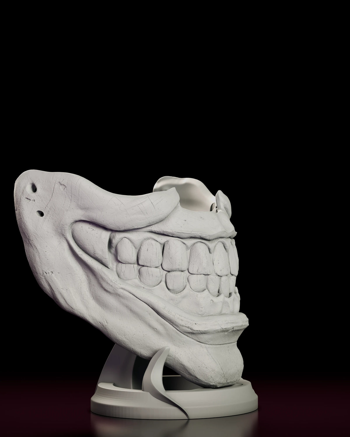 Right side view of the Twisty mask showing the jaw and the edge of the grin