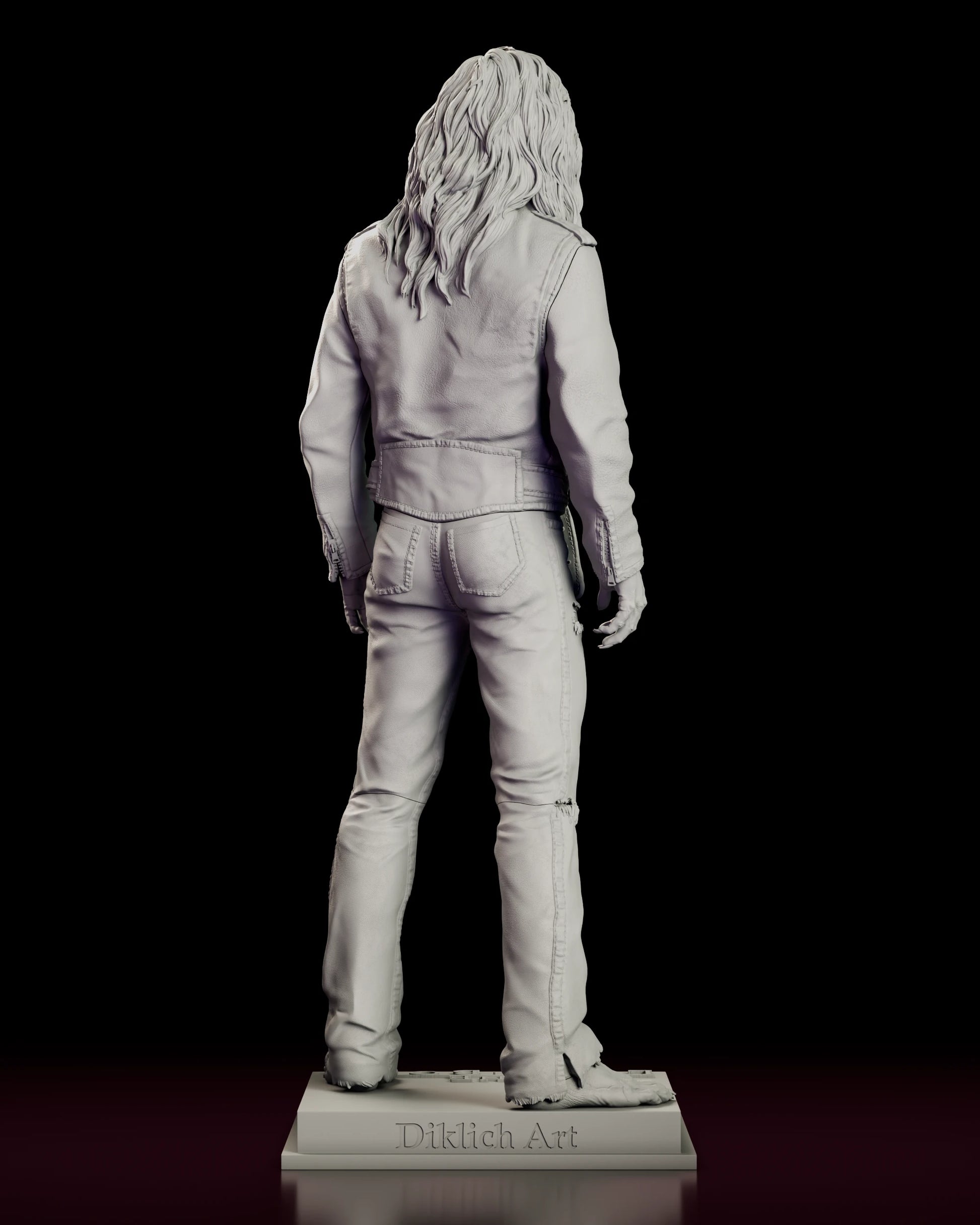 Rear view of the vampire Dwayne figure model kit showing the hair spread over the jacket back and the sculptor name on the rear edge of the base