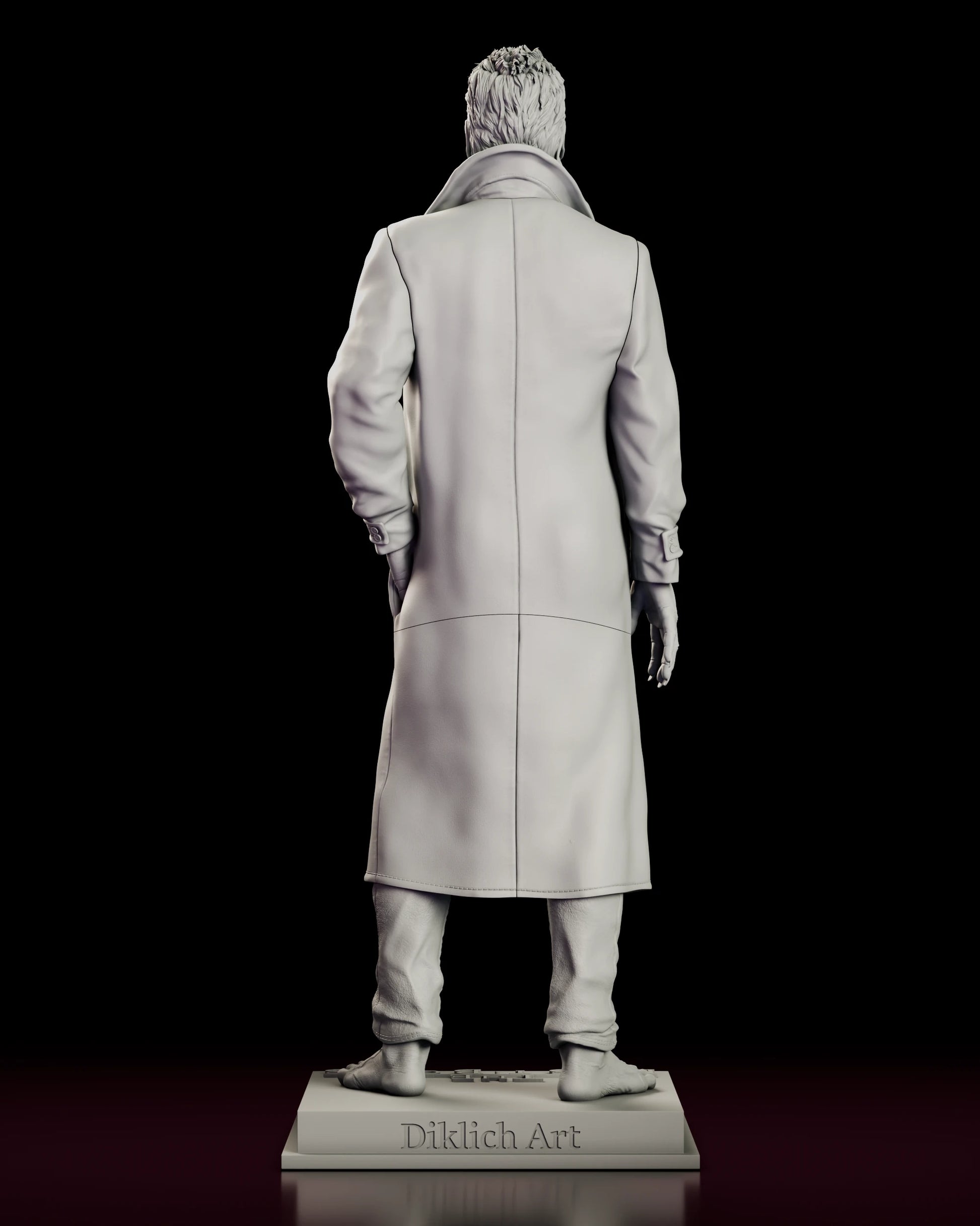 Rear view of the vampire David figure model kit showing the seamed back of the long coat, the bare heels and the sculptor name on the rear edge of the base