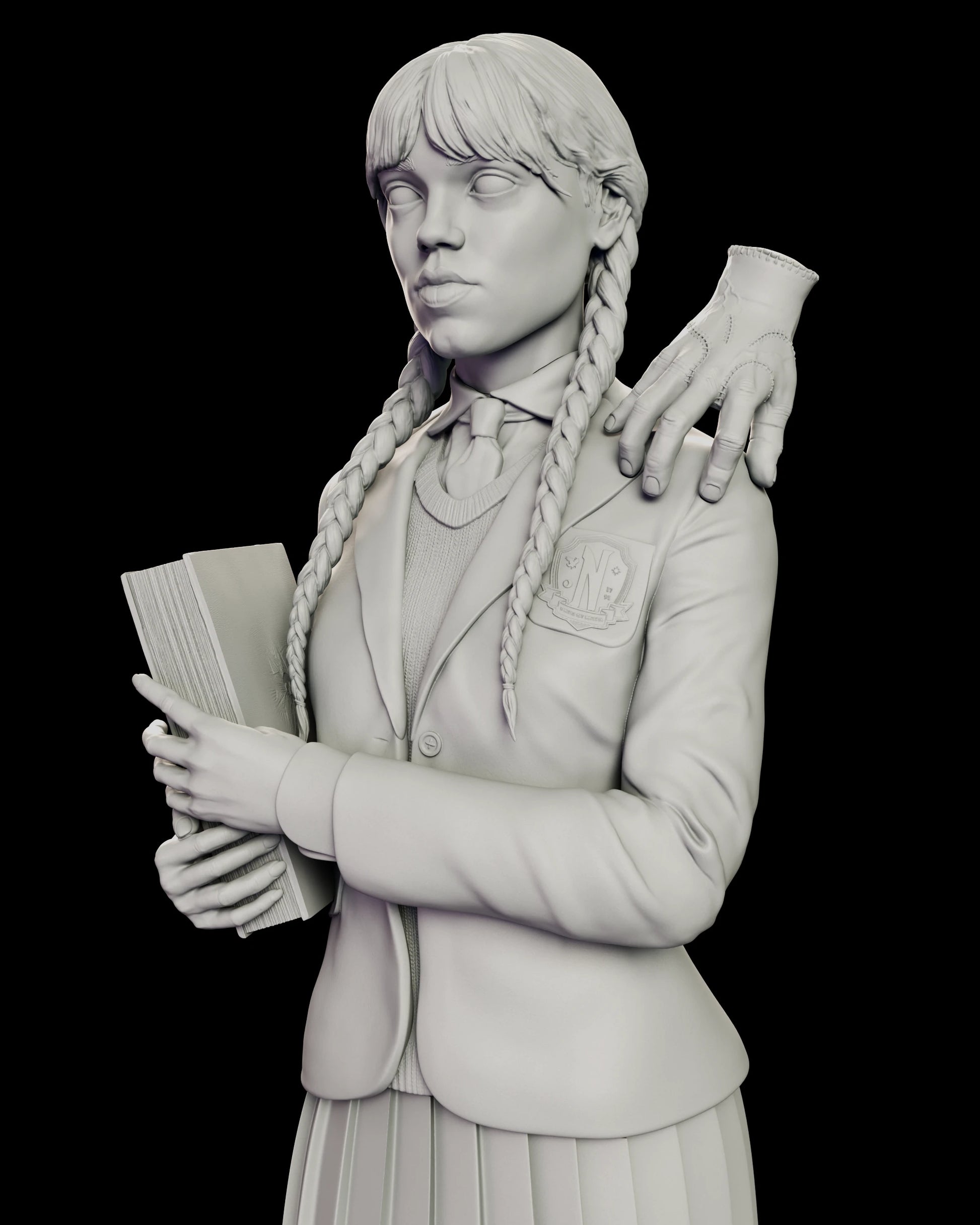 Close detail of the Wednesday Addams figure model kit showing Thing resting on her left shoulder with his stitched wrist and scarred knuckles, beside the crested blazer, knit sweater and striped tie